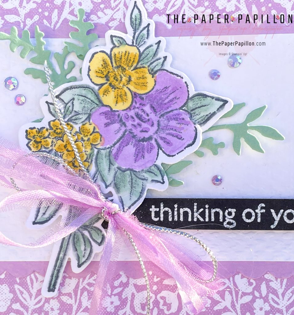 Close up of floral detail with embellishments on diy stamped bouquet handmade card